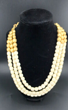 Vintage-inspired Plunder Design multi-strand beaded necklace.